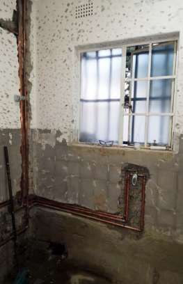 Bathroom plumbing before